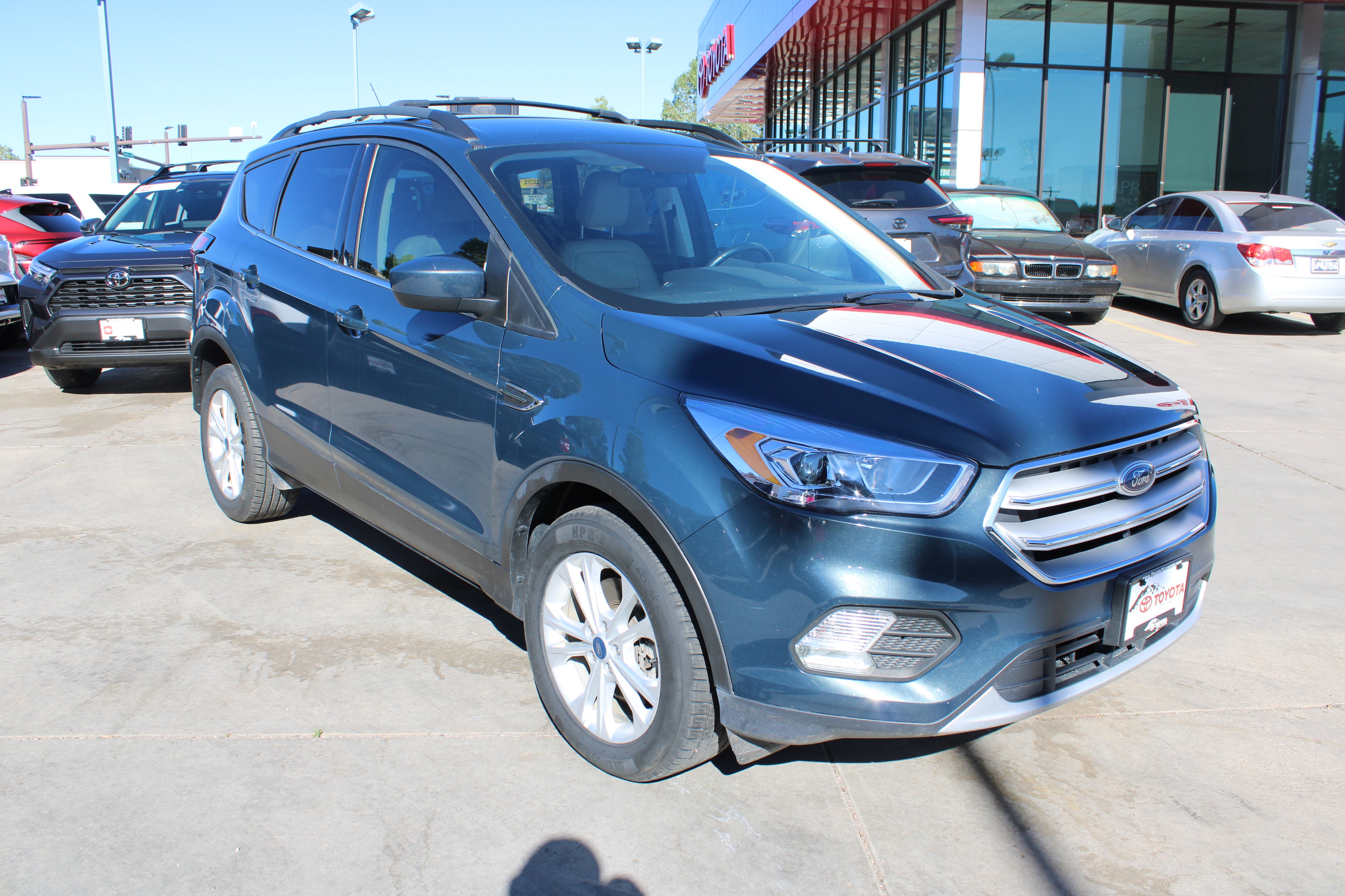 2019 Ford Escape SEL in Gray — front three-quarter view