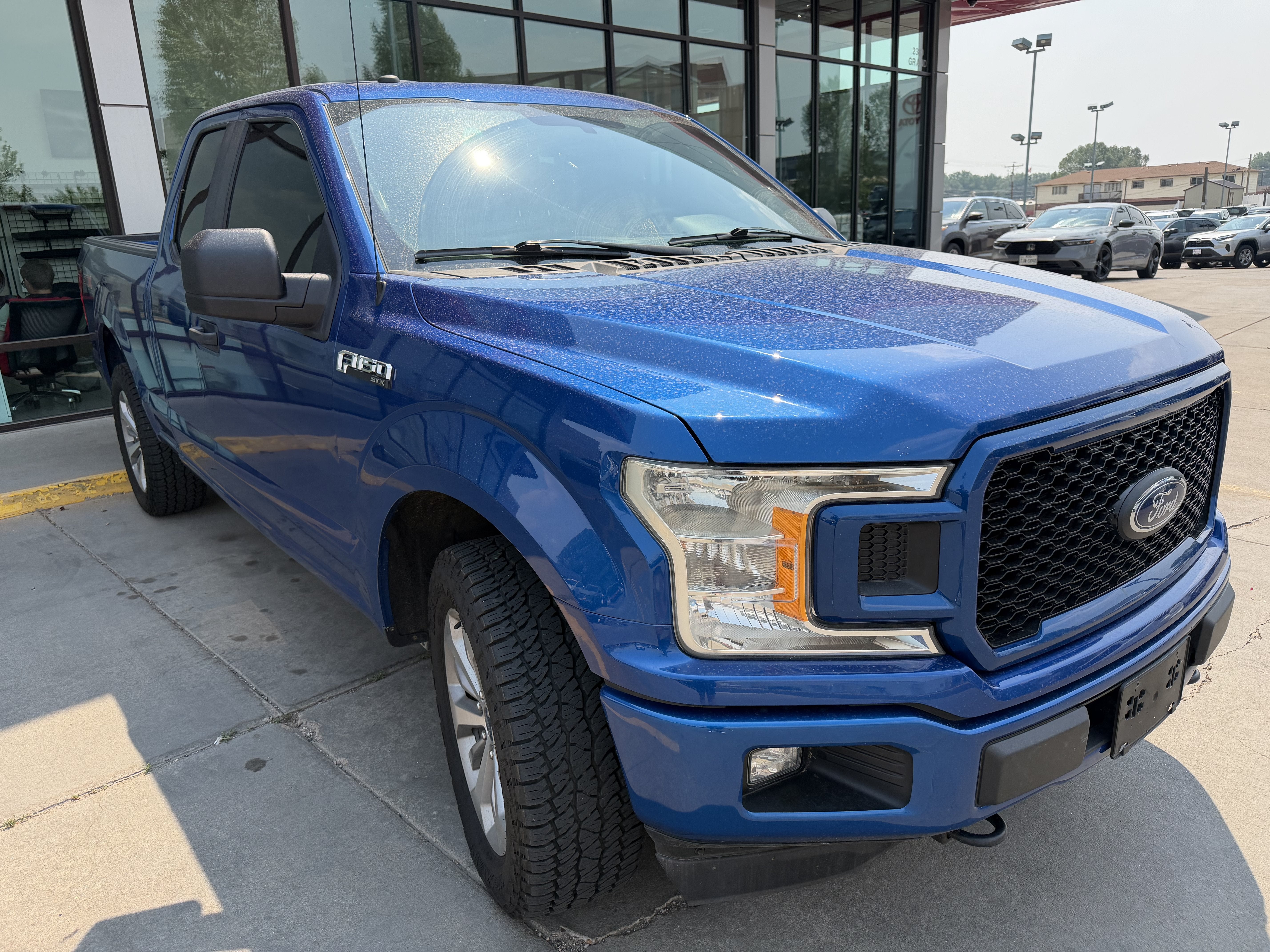 2018 Ford F-150 XL in Blue — front three-quarter view