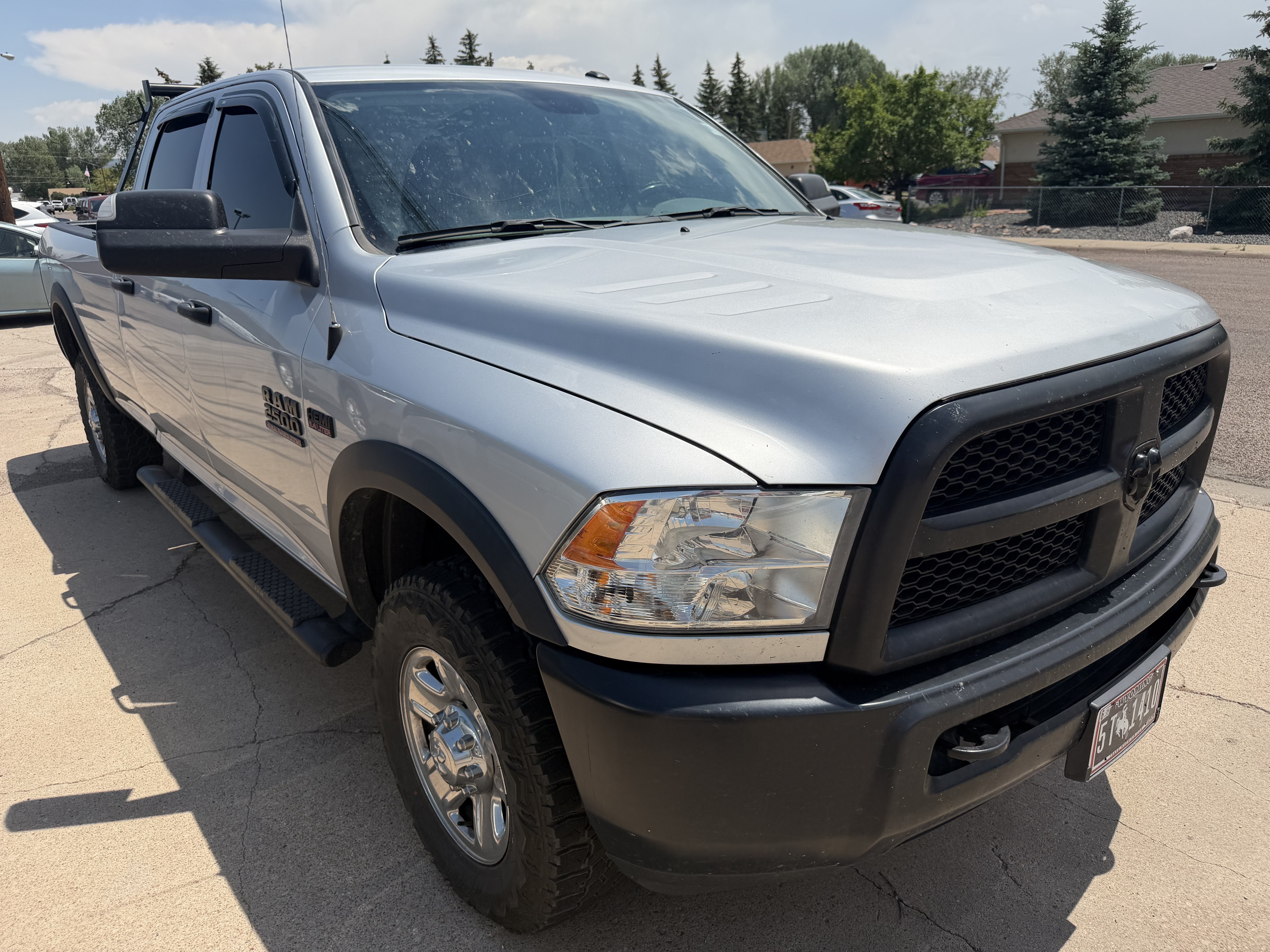 2018 RAM 2500 Tradesman in Bright Silver Metallic Clearcoat — front three-quarter view