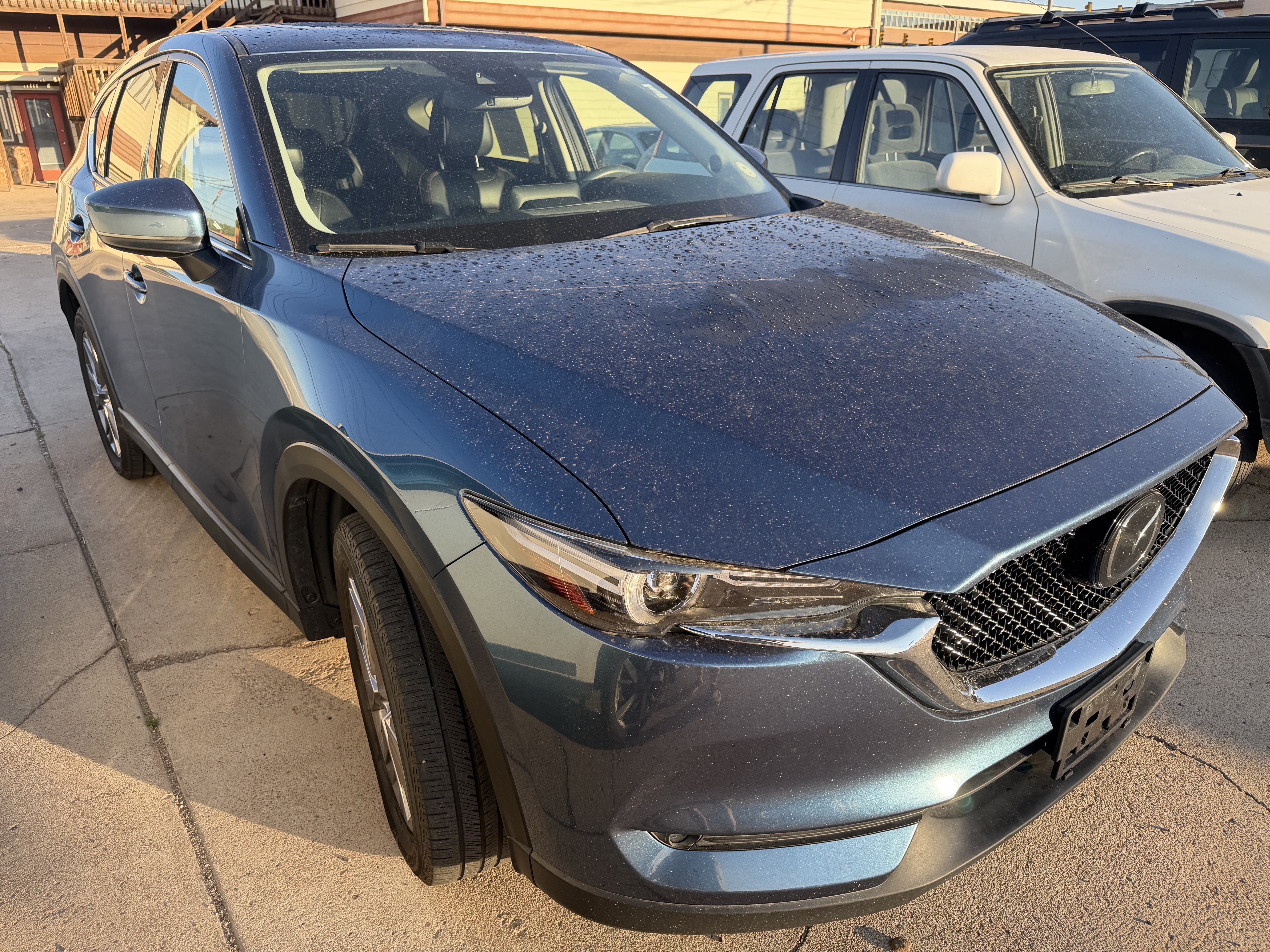 2019 Mazda Mazda CX-5 Grand Touring in Eternal Blue Mica — front three-quarter view