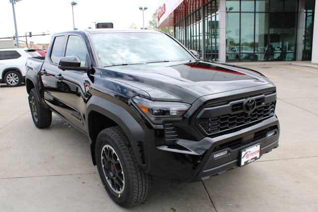 2026 Toyota Tacoma TRD Off-Road in Black — front three-quarter view
